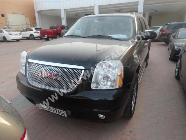 GMC  Denali XL  Yukon  2012  125,000  Coupe / Sport  Automatic  8  Leather  RWD  Black  Gasoline