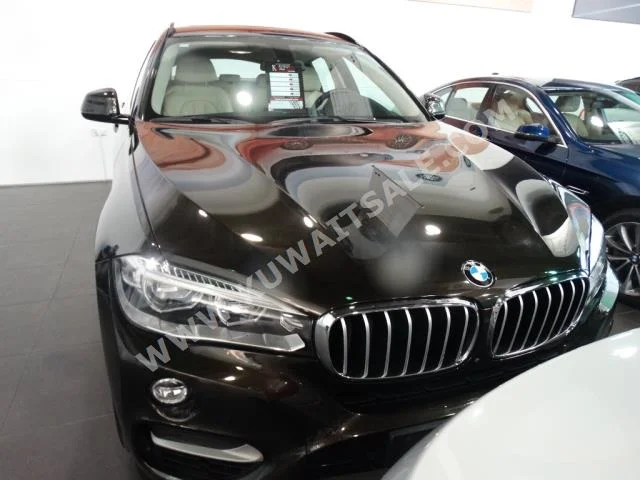 بي ام دبليو  6  الفئة - اكس  2015  21,000  اس يو في  اتوماتك  8  جلد  دفع رباعي  أسود  بنزين