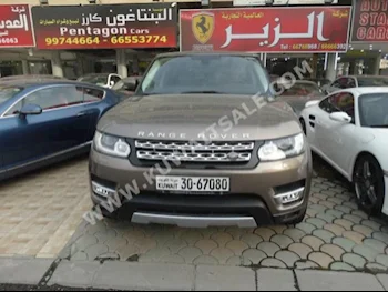 Land Rover  HSE  Range Rover  2015  57,000  SUV  Automatic  6  Leather  4WD  Bronze  Gasoline