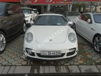 Porsche  Turbo  Carrera  2007  100,000  Coupe / Sport  Automatic  6  Leather  RWD  White  Gasoline