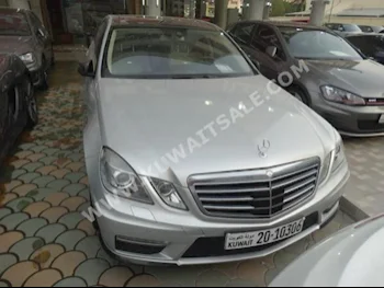 Mercedes-Benz  63 AMG  E-Class  2010  37,000  Sedan  Automatic  6  Leather  RWD  Silver  Gasoline