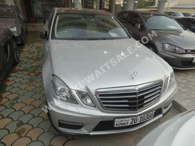 Mercedes-Benz  63 AMG  E-Class  2010  37,000  Sedan  Automatic  6  Leather  RWD  Silver  Gasoline