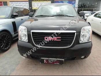 GMC  Yukon  2011  112,000  SUV  Automatic  8  Cloth  4WD  Black  Gasoline