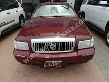 Ford  Grand Marquis  2010  150,000  Sedan  Automatic  8  Cloth  RWD  Dark Red  Gasoline