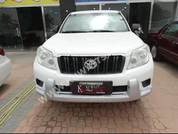 Toyota  TX  Prado  2011  140,000  SUV  Automatic  6  Cloth  RWD  White  Gasoline