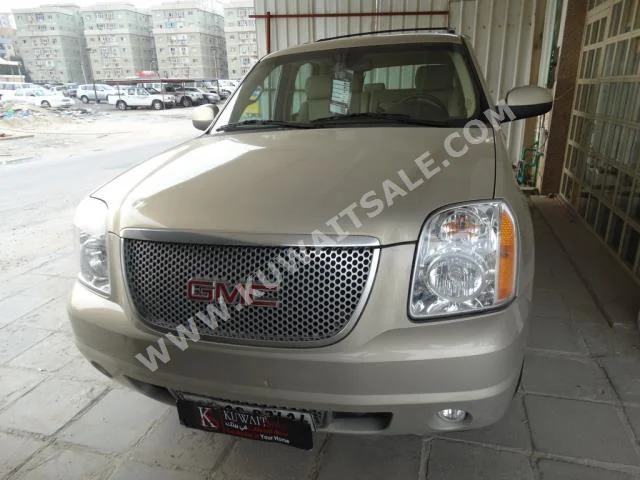 GMC  Yukon  2011  169,000  SUV  Automatic  8  Cloth  4WD  Gold  Gasoline