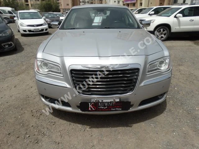 Chrysler  300C  2012  44,000  Sedan  Automatic  6  Leather  RWD  Silver  Gasoline