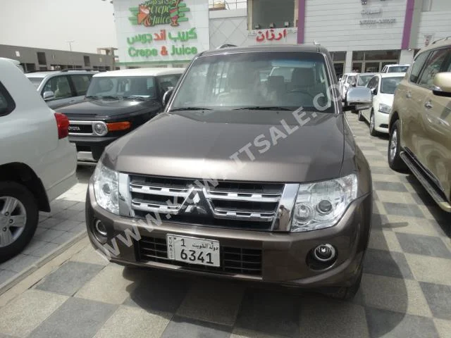 Mitsubishi  GLS  Pajero  2014  84,000  SUV  Automatic  6  Cloth  4WD  Brown  Gasoline