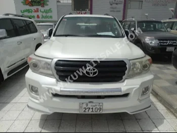 Toyota  GXR  Land Cruiser  2010  160,000  SUV  Automatic  6  Cloth  4WD  White  Gasoline