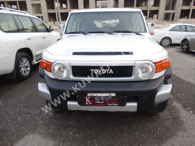 Toyota  FJ Cruiser  2011  260,000  SUV  Automatic  6  Cloth  4WD  White  Gasoline
