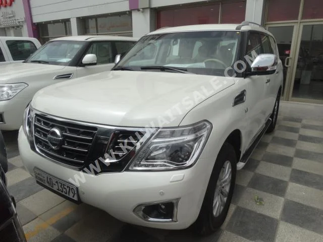 Nissan  SE  Patrol  2016  32,000  SUV  Automatic  8  Cloth  4WD  White  Gasoline