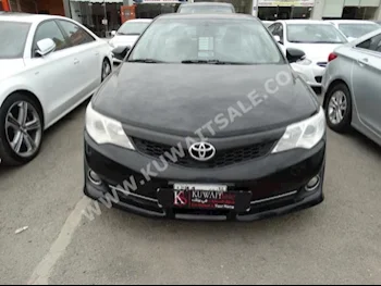 Toyota  GLX  Camry  2013  150,000  Sedan  Automatic  4  Cloth  FWD  Black  Gasoline