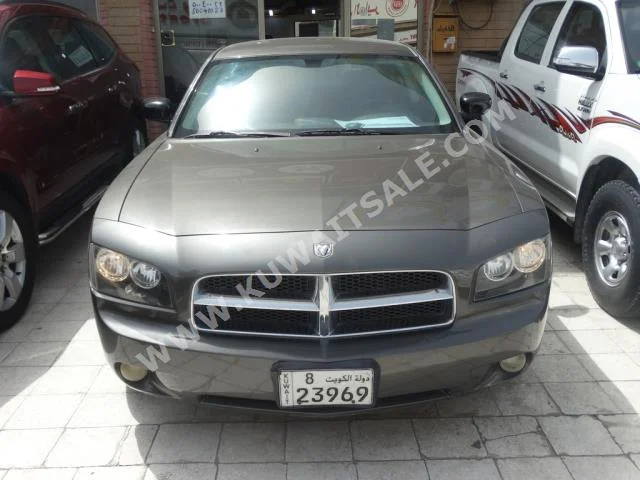 دودج  تشارجر  2010  235,000  سيدان  اتوماتك  6  مخمل  دفع خلفي  رمادي  بنزين