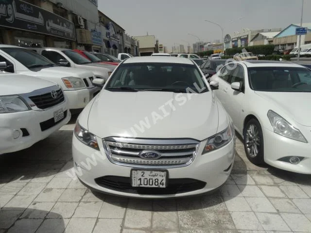 فورد  تورس  2011  110,000  سيدان  اتوماتك  6  مخمل  دفع أمامي  أبيض  بنزين