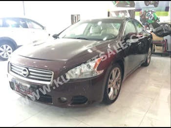 Nissan  Maxima  2013  94,000  Sedan  Automatic  6  Cloth  FWD  Maroon  Gasoline
