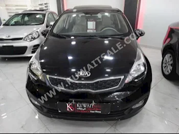 Kia  Rio  2015  0  Sedan  Automatic  4  Cloth  FWD  Black  Gasoline