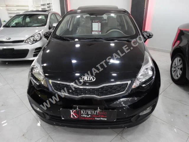 Kia  Rio  2015  0  Sedan  Automatic  4  Cloth  FWD  Black  Gasoline