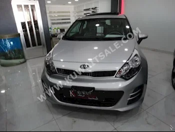 Kia  Rio  2015  0  Hatchback  Automatic  4  Cloth  FWD  Silver  Gasoline