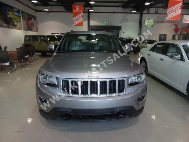 Jeep  Laredo  Grand Cherokee  2013  171,000  SUV  Automatic  8  Cloth  4WD  Silver  Gasoline