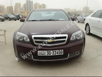Chevrolet  LS  Caprice  2014  55,000  Sedan  Automatic  8  Cloth  RWD  Maroon  Gasoline