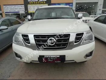 Nissan  SE  Patrol  2014  49,000  SUV  Automatic  8  Cloth  RWD  White  Gasoline