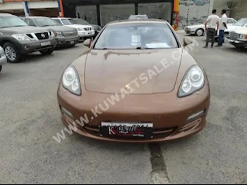 Porsche  S  Panamera  2010  75,000  Sedan  Automatic  8  Leather  RWD  Brown  Gasoline