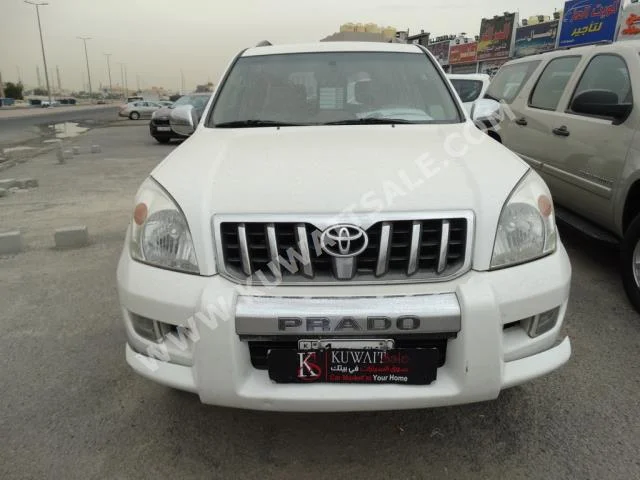 Toyota  VX  Prado  2003  251,000  SUV  Automatic  6  Cloth  4WD  White  Gasoline