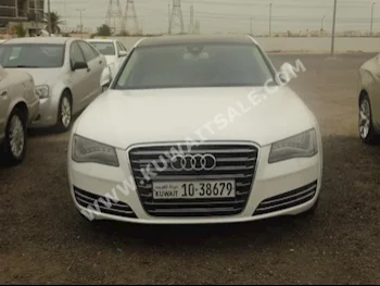 اودي  أل  أي 8  2011  100,000  سيدان  اتوماتك  8  جلد  دفع خلفي  أبيض  بنزين