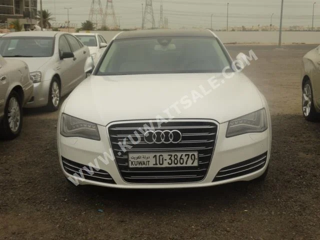 اودي  أل  أي 8  2011  100,000  سيدان  اتوماتك  8  جلد  دفع خلفي  أبيض  بنزين