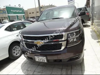 Chevrolet  LS  Tahoe  2015  60,000  SUV  Automatic  8  Cloth  4WD  Brown  Gasoline