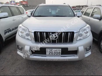 Toyota  TX.L  Prado  2013  70,000  SUV  Automatic  6  Cloth  4WD  Silver  Gasoline