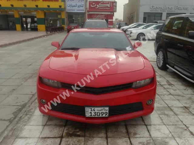 Chevrolet  RS  Camaro  2015  77,000  Coupe / Sport  Automatic  6  Leather  RWD  Red  Gasoline