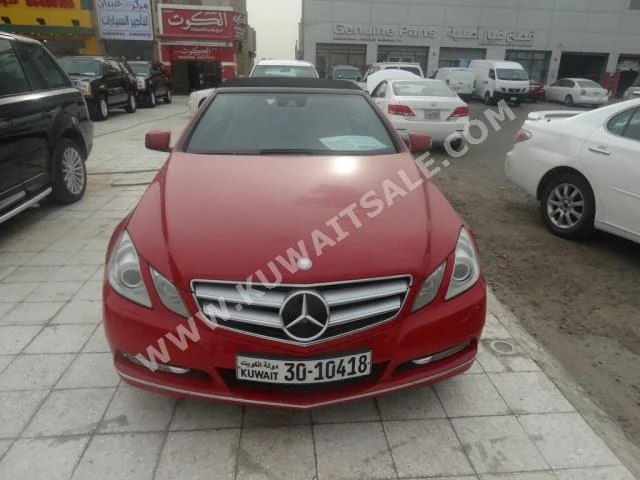 Mercedes-Benz  250  E-Class  2012  150,000  Coupe / Sport  Automatic  4  Leather  RWD  Red  Gasoline