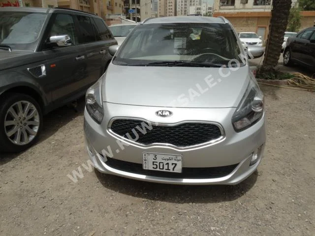 Kia  Carens  2014  100,000  Hatchback  Automatic  4  Cloth  RWD  Silver  Gasoline