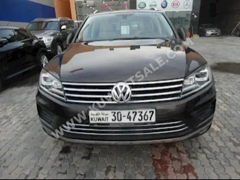 فوكس واغن  طوارق  2015  32,000  اس يو في  اتوماتك  6  جلد  دفع رباعي  بني  بنزين