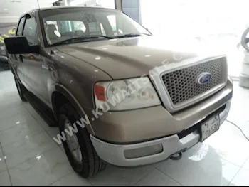 Ford  150  F  2004  257,000  Pick Up  Automatic  8  Cloth  4WD  Gold  Gasoline