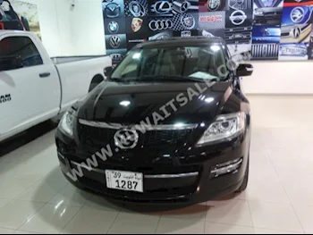 مازدا  9  سي اكس  2008  108,000  اس يو في  اتوماتك  6  جلد  دفع رباعي  أسود  بنزين