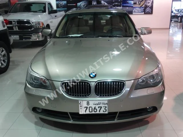 BMW  525i  5-Series  2006  128,000  Sedan  Automatic  6  Leather  RWD  Gold  Gasoline
