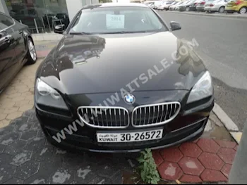 BMW  640i  6-Series  2014  55,000  Coupe / Sport  Automatic  6  Leather  RWD  Black  Gasoline