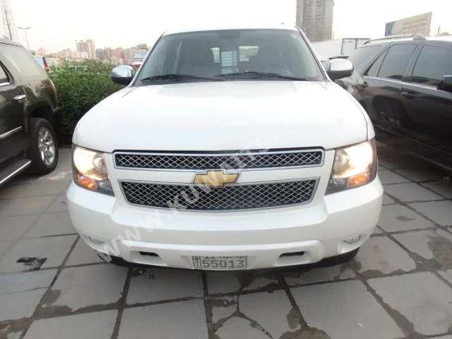 Chevrolet  LTZ  Tahoe  2013  100,000  SUV  Automatic  8  Leather  4WD  White  Gasoline