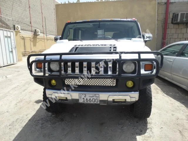 همر  اتش 2  2003  180,000  اس يو في  اتوماتك  8  جلد  دفع رباعي  أبيض  بنزين