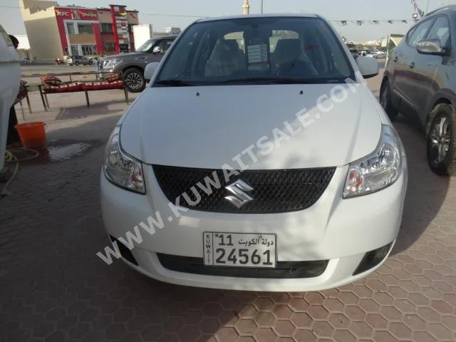 Suzuki  SX4  2014  28,000  Sedan  Automatic  4  Cloth  FWD  White  Gasoline