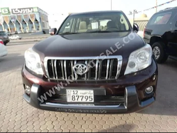 Toyota  TX.L  Prado  2013  50,000  SUV  Automatic  6  Cloth  4WD  Dark Red  Gasoline