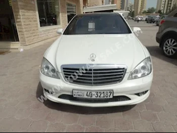 Mercedes-Benz  500  S-Class  2007  107,000  Sedan  Automatic  8  Leather  RWD  White  Gasoline