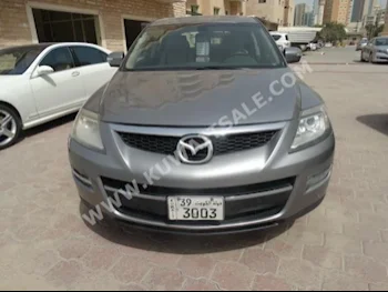 Mazda  9  CX  2009  163,000  SUV  Automatic  6  Cloth  RWD  Silver  Gasoline