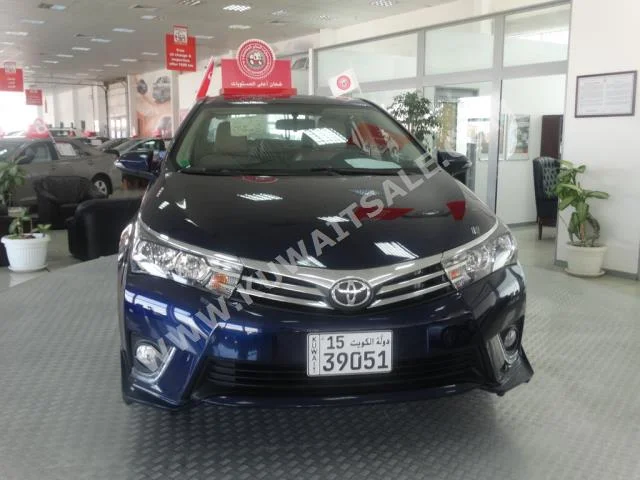Toyota  GLI  Corolla  2015  16,000  Sedan  Automatic  4  Cloth  FWD  Dark Blue  Gasoline