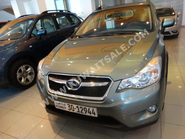 Subaru  XV  2013  85,000  SUV  Automatic  4  Cloth  4WD  Light Green  Gasoline