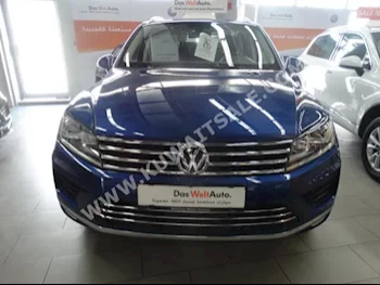 Volkswagen  Touareg  2015  44,000  SUV  Automatic  6  Leather  4WD  Blue  Gasoline