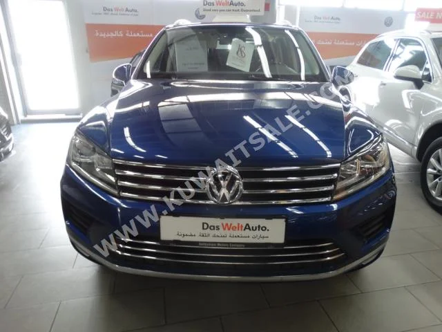 Volkswagen  Touareg  2015  44,000  SUV  Automatic  6  Leather  4WD  Blue  Gasoline