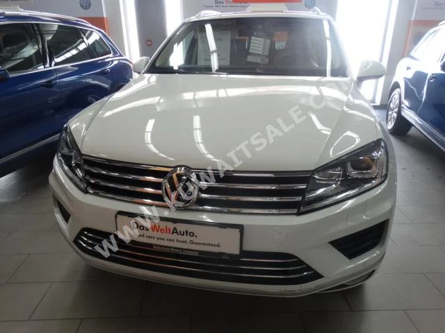 Volkswagen  Touareg  2016  42,000  SUV  Automatic  6  Leather  4WD  White  Gasoline